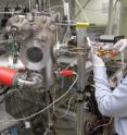 Clemson graduate student Githin Alapatt tests a silicon sample using the Copper Oxide Deposition System.