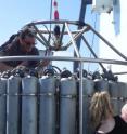 Princeton University graduate student Andrew Babbin (right) prepares a seawater collection device known as a rosette. The team used samples of seawater to determine how nitrogen is removed from the oceans. Princeton University graduate student Andrew Babbin (right) prepares a seawater collection device known as a rosette. The team used samples of seawater to determine how nitrogen is removed from the oceans.