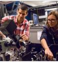 The two researchers, Postdoc Immo Söllner (left) and PhD-student Marta Arcari (right) have been the driving force in the work with the experiment here at the quantum photonics lab at the Niels Bohr Institute.