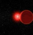 This is an artist's conception of Scholz's star and its brown dwarf companion (foreground) during its flyby of the solar system 70,000 years ago. The Sun (left, background) would have appeared as a brilliant star. The pair is now about 20 light years away. This is an artist's conception of Scholz's star and its brown dwarf companion (foreground) during its flyby of the solar system 70,000 years ago. The Sun (left, background) would have appeared as a brilliant star. The pair is now about 20 light years away.