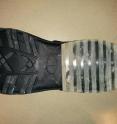The heel of this prototype winter shoe is made from a rubbery plastic embedded with tens of thousands of tiny glass fibers that protrude out of the rubber like microscopic studs to grip the ice. The heel of this prototype winter shoe is made from a rubbery plastic embedded with tens of thousands of tiny glass fibers that protrude out of the rubber like microscopic studs to grip the ice.