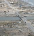 This aerial photo taken just days after Hurricane Ike in September 2008 shows a damaged bridge and the remains of houses on the Bolivar Peninsula of Texas.