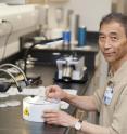 Xiong (Sean) Yu, Ph.D., demonstrates a step in the lengthy process of preparing a sample for analysis.