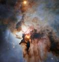 This new NASA/ESA Hubble Space Telescope image shows the Lagoon Nebula, an object with a deceptively tranquil name. The region is filled with intense winds from hot stars, churning funnels of gas, and energetic star formation, all embedded within an intricate haze of gas and pitch-dark dust.