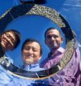 (From left to right): Stanford doctoral candidate Linxiao Zhu, electrical engineering professor Shanhui Fan, and research associate Aaswath P. Raman are developing materials to shunt heat into space in a process they call "radiative cooling."  Their current work involves a transparent overlay to cool solar cells.