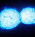 This artist's impression shows VFTS 352 -- the hottest and most massive double star system to date where the two components are in contact and sharing material. The two stars in this extreme system lie about 160,000 light-years from Earth in the Large Magellanic Cloud. This intriguing system could be heading for a dramatic end, either with the formation of a single giant star or as a future binary black hole.