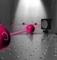 Orbital angular momentum (OAM) vortices (pink ringlike objects) are laser light structures that rotate around a central beam, much like water circles around a drain. Physicists and engineers have studied this type of laser vortex since the 1990s as a tool to help improve microscopy and telecommunications.