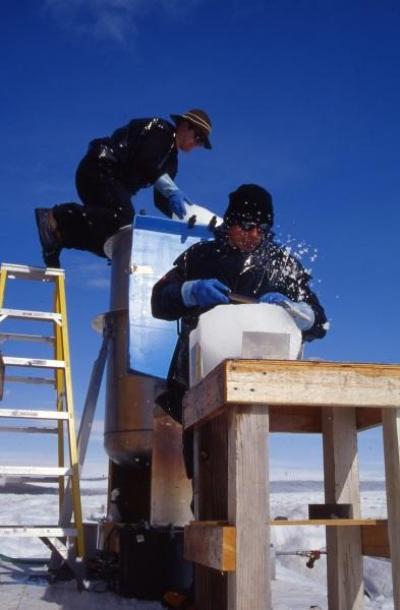 oceanography professor jeff severinghaus loads another ice block